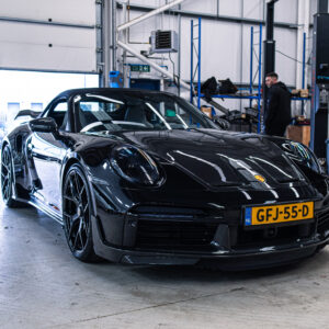 Porsche 992 Turbo S with ESMotor Carbon aero kit, front three-quarter view