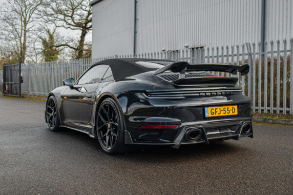Porsche 992 Turbo S with ESMotor Carbon aero kit, rear three-quarter view